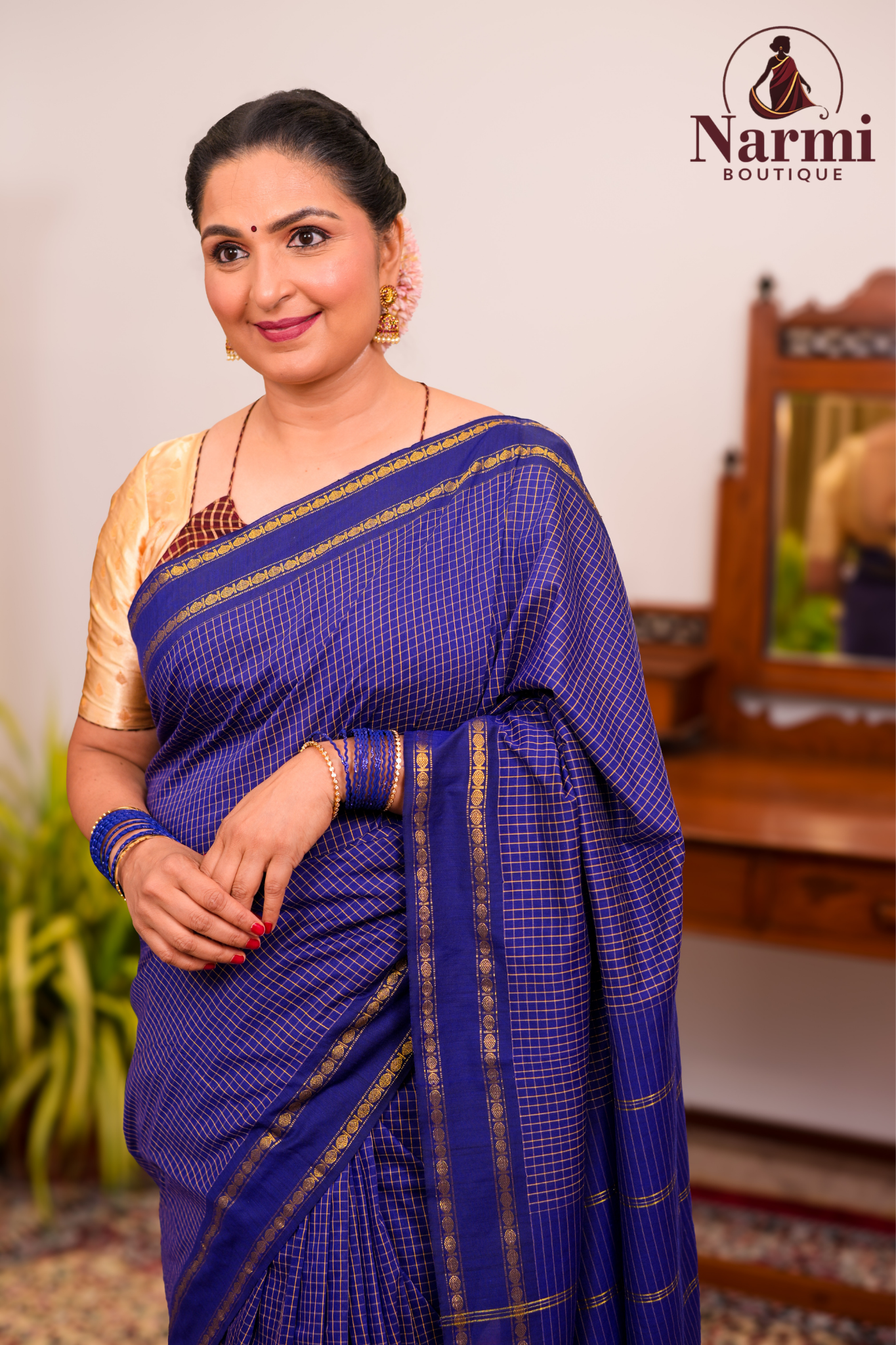 Mangai (மங்கை)